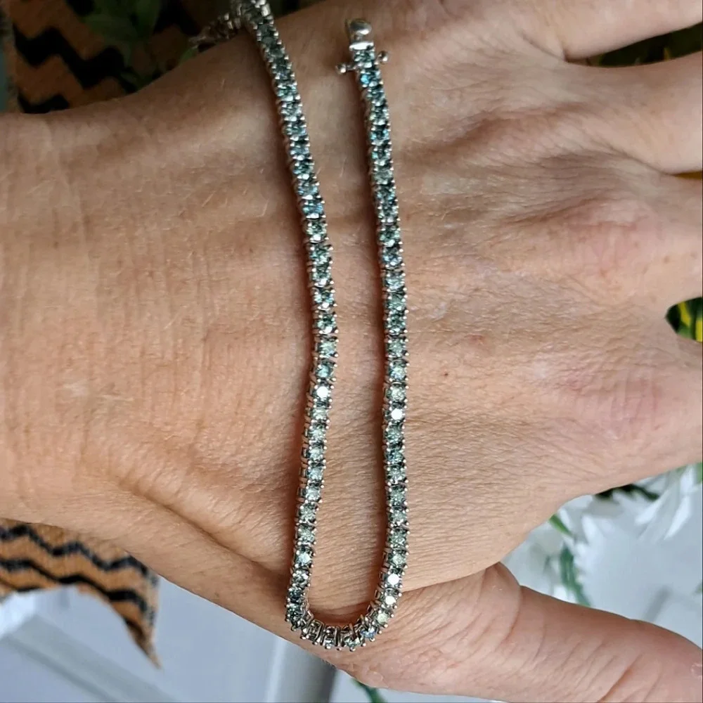Genuine Blue Moissanite Tennis Bracelet In 925 Sterling Silver.